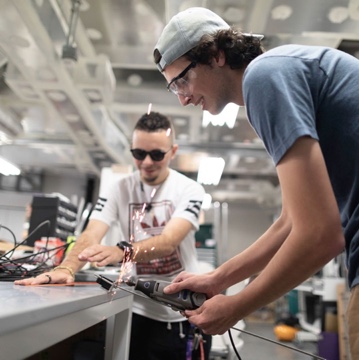 Male student welding